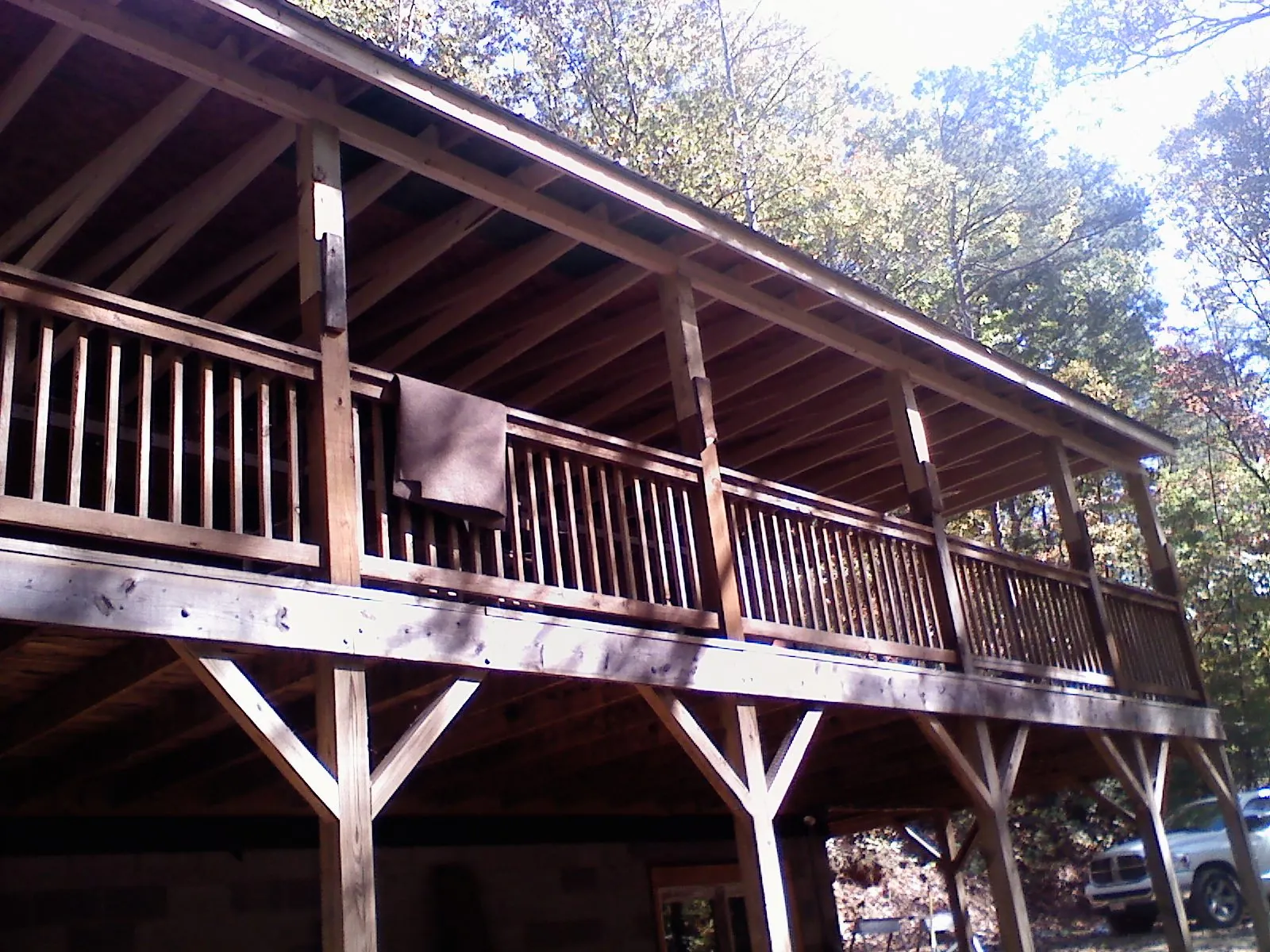 Timber framing under a new elevated porch and deck — Roof Leak Repair in Howard by Roofing Brothers